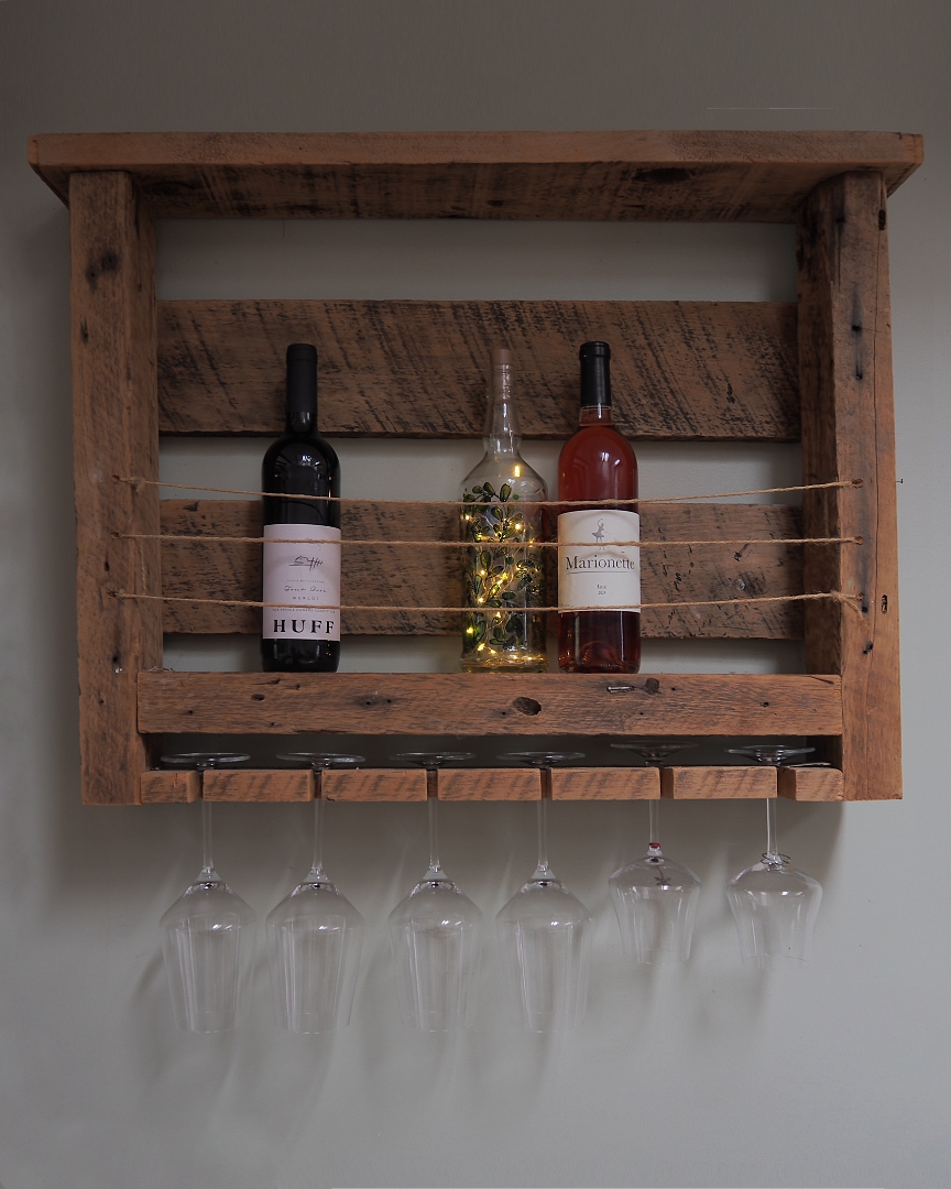 Person sitting by window working on tablet